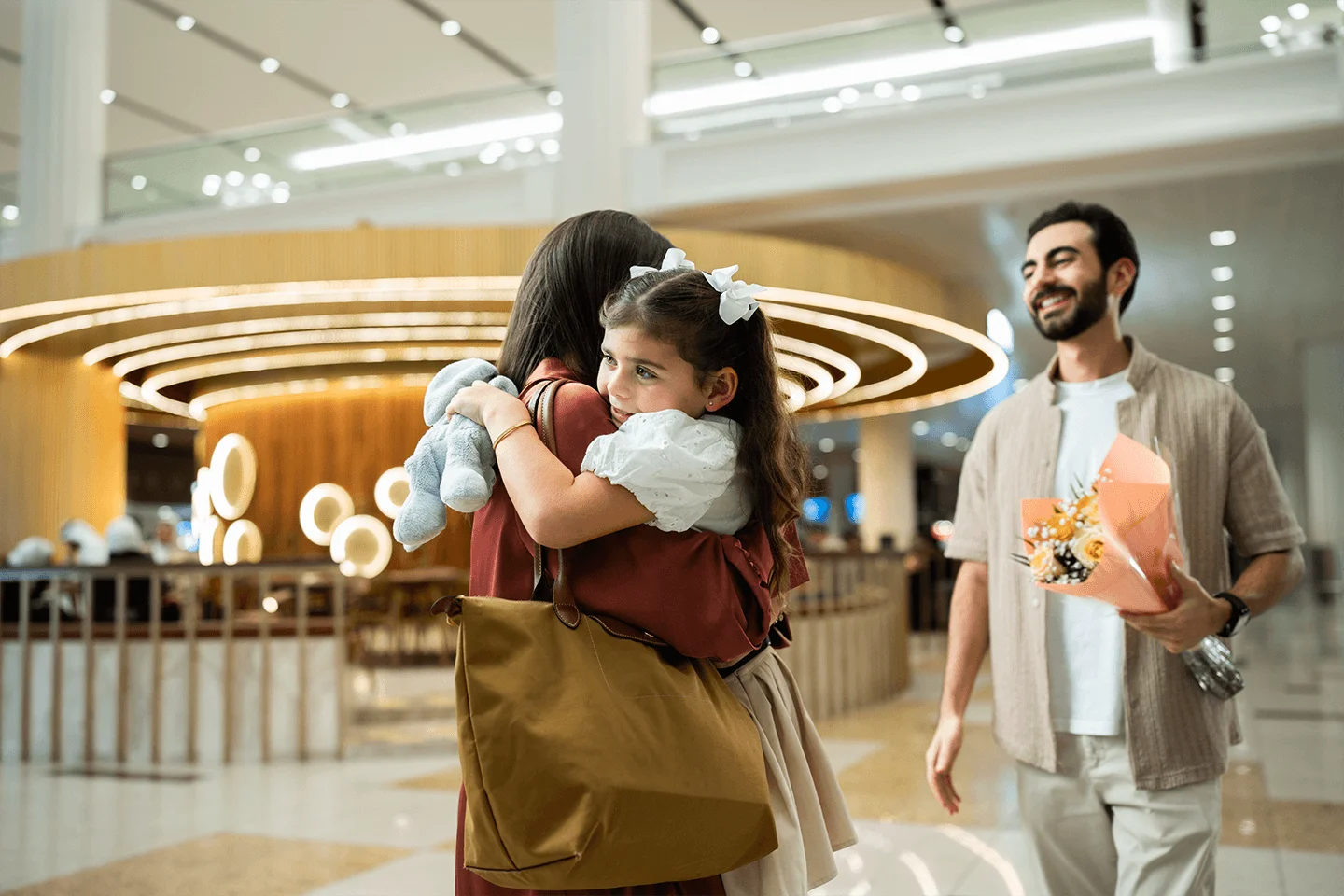 Family travelling through Dubai International Airport
